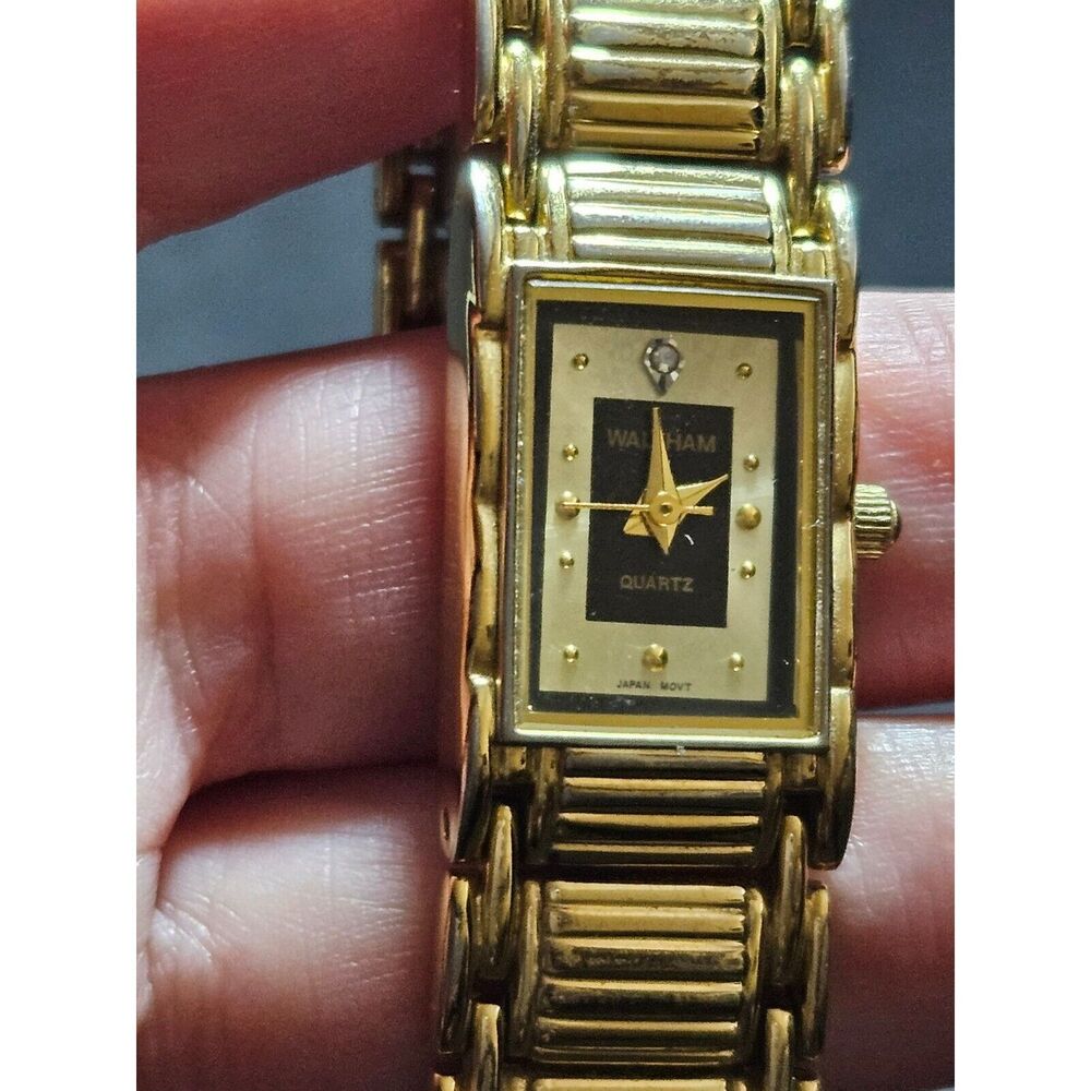 **Sale** Waltham gold tone watch with diamond accent